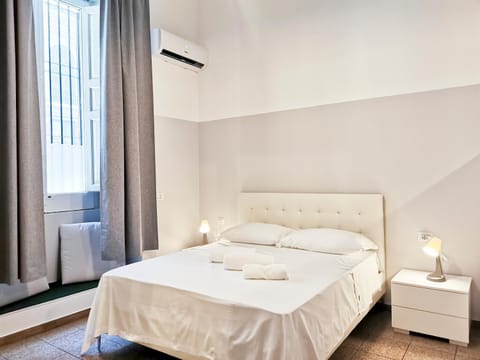 Bed, Photo of the whole room, Bedroom, towels, air conditioner