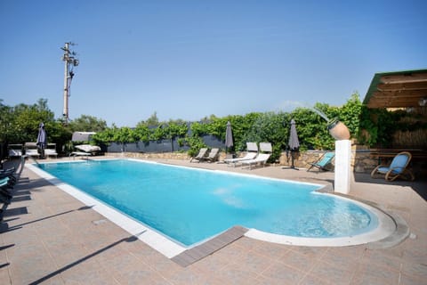 Property building, Living room, Swimming pool