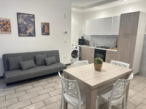 Kitchen or kitchenette, Living room, Seating area, Dining area, oven, stove, washing machine