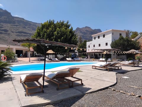 Property building, Pool view, Swimming pool, sunbed