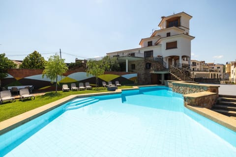 Property building, Living room, Swimming pool