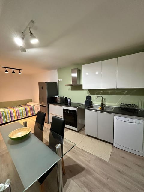 Kitchen or kitchenette, Seating area, Dining area, dishwasher, oven, stove