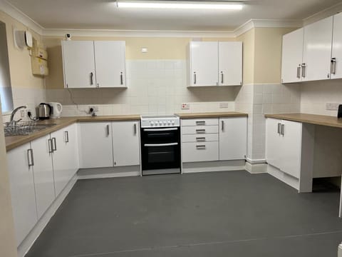 Kitchen or kitchenette, oven, stove, toaster