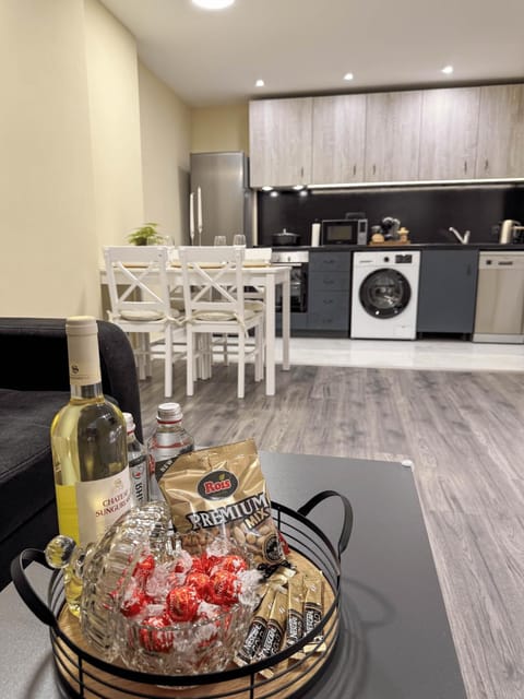 Communal lounge/ TV room, Kitchen or kitchenette, Living room, Dining area, dishwasher, oven, stove, washing machine, dryer, kitchen