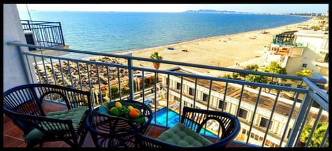 View (from property/room), Balcony/Terrace, Seating area, Beach, Sea view