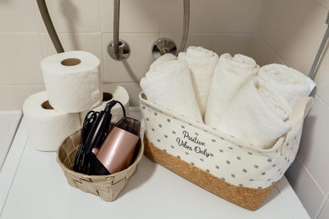 Bathroom, hair dryier, towels