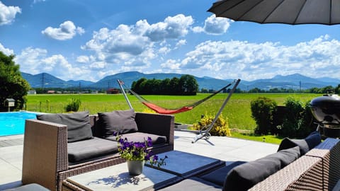 Patio, Natural landscape, Garden, Seating area, Garden view, Mountain view, Swimming pool, sunbed