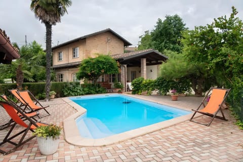 Property building, Living room, Swimming pool