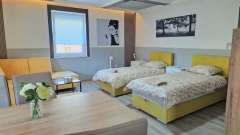 Bed, Living room, Seating area, Bedroom
