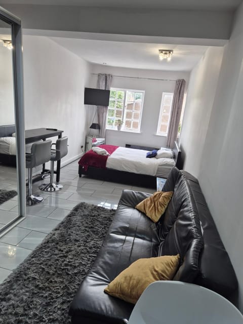 Bed, Living room, Seating area, Bedroom