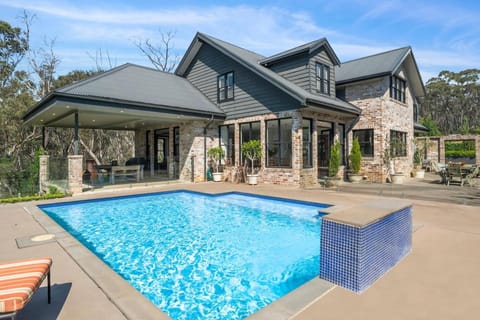 Property building, Patio, Pool view, Swimming pool, sunbed