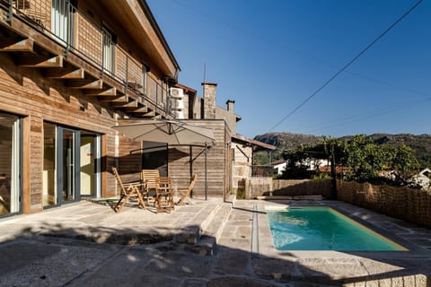 Property building, Living room, Swimming pool