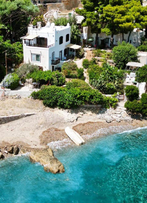 Property building, Nearby landmark, Day, Natural landscape, Beach, Sea view