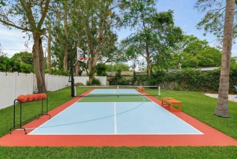 Resort Style Backyard Pool Sport Court Putt Putt House in Florida
