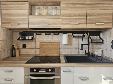 Kitchen or kitchenette, stove