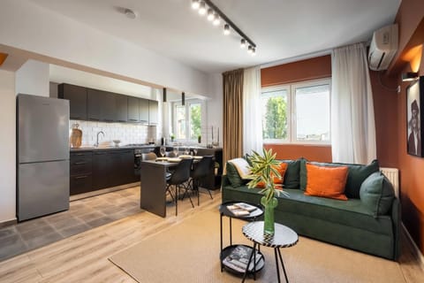 Kitchen or kitchenette, Living room, Seating area, Dining area