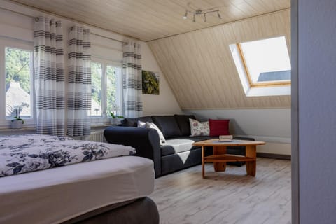 Bed, Living room, Seating area