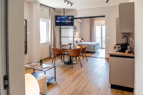 TV and multimedia, Kitchen or kitchenette, Living room, Photo of the whole room, Seating area, Dining area, minibar