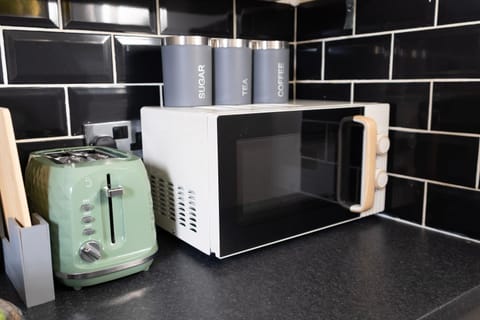Kitchen or kitchenette, microwave, toaster