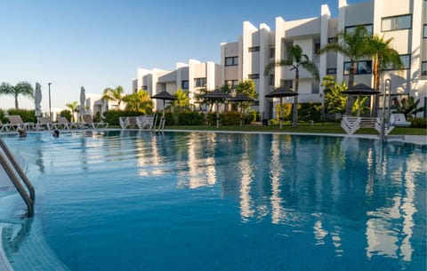 Property building, Pool view, Swimming pool, sunbed