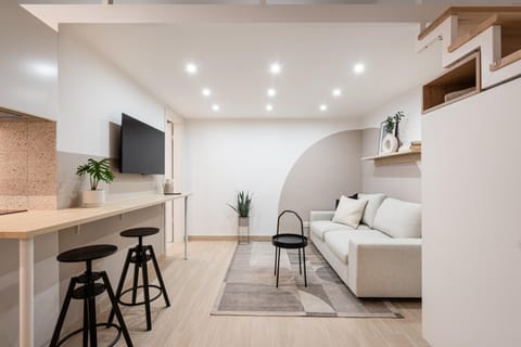 Property building, TV and multimedia, Living room, Seating area, Dining area, Family