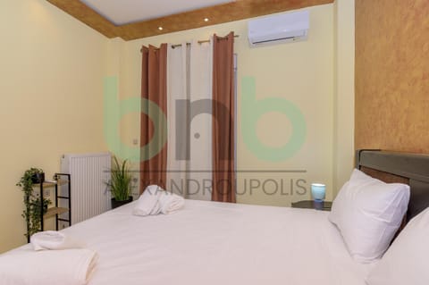 Bed, Photo of the whole room, Bedroom, towels, air conditioner