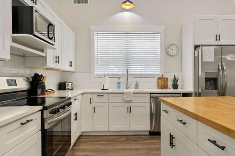 Kitchen or kitchenette, dishwasher, oven, stove, toaster