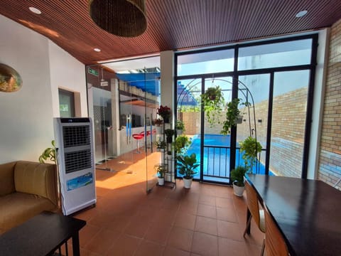 Communal lounge/ TV room, Seating area, Pool view