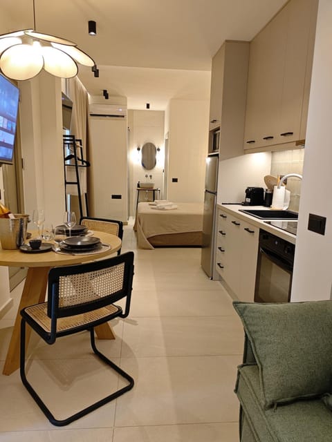 Kitchen or kitchenette, Living room, Seating area, Dining area