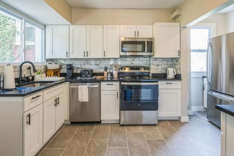 Kitchen or kitchenette, dishwasher, oven, stove