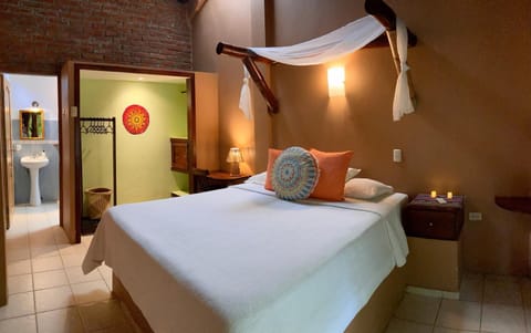 Bed, Bathroom, Photo of the whole room, Decorative detail, Bedroom, microwave, wardrobe