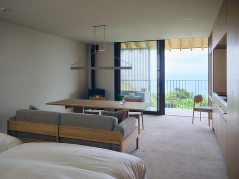 Bed, Living room, Seating area, Bedroom
