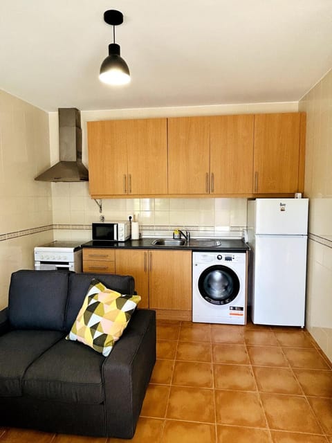 Kitchen or kitchenette, Living room, Seating area, oven, stove