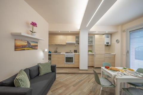 Kitchen or kitchenette, Living room, Seating area, Dining area, Inner courtyard view, dishwasher, internet, oven, stove, air conditioner