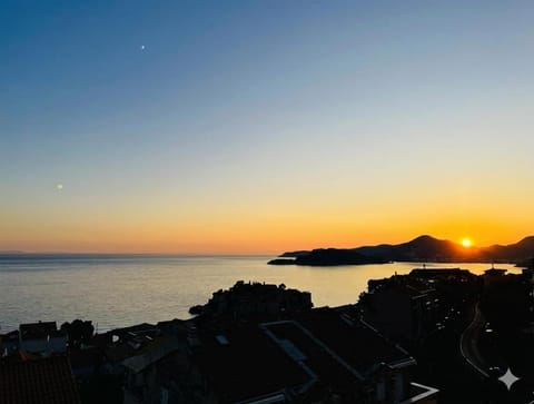 Nearby landmark, Natural landscape, Mountain view, Sea view, Sunset