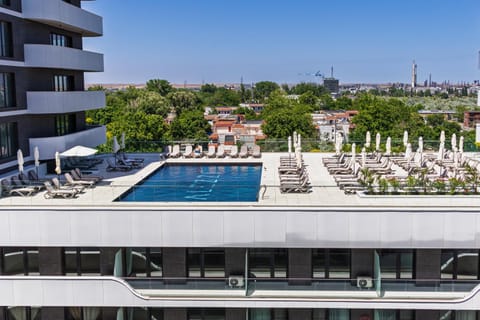 Property building, Pool view, Swimming pool, sunbed