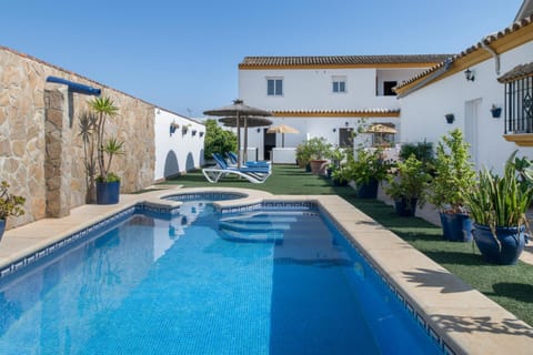 Property building, Living room, Swimming pool