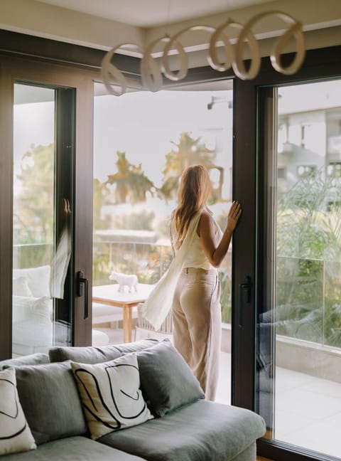 People, View (from property/room), Balcony/Terrace, Living room, Seating area