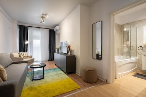 Bathroom, Living room, Photo of the whole room, Seating area, Bath