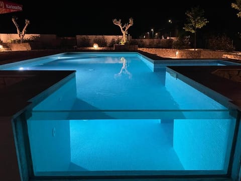 Property building, Night, Pool view, Swimming pool