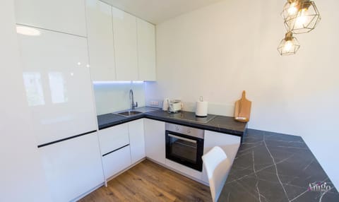 Kitchen or kitchenette, oven, stove, toaster