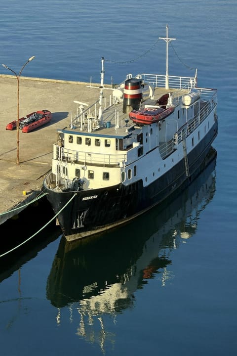 Lofoten Cruise & Hotel Docked boat in Lofoten