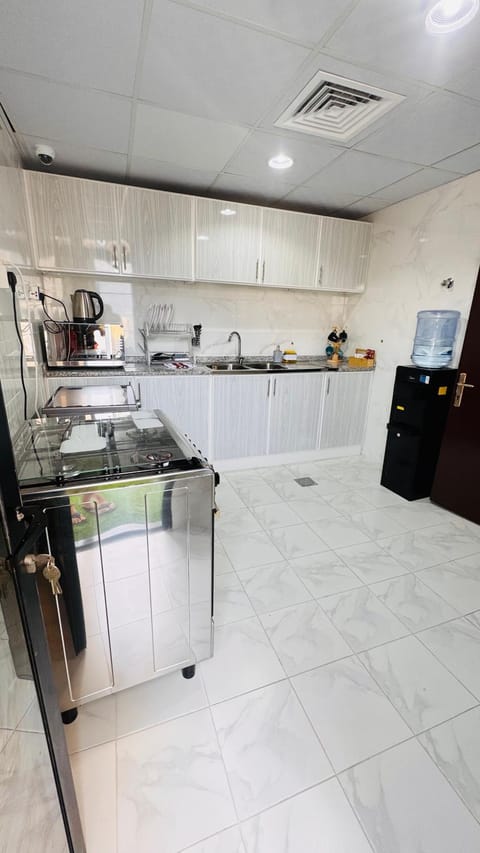 Kitchen or kitchenette, stove, toaster