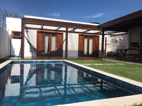 Property building, Patio, Day, Natural landscape, Pool view, Swimming pool