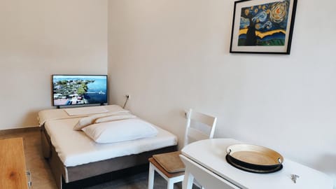 Bed, TV and multimedia