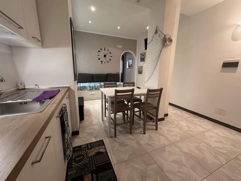 Kitchen or kitchenette, Living room, Seating area, Dining area, stove