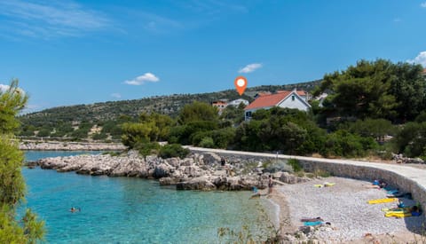Property building, Nearby landmark, Facade/entrance, Day, Beach, Sea view, Location