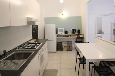 Kitchen or kitchenette, Dining area, dishwasher, oven, stove, wardrobe