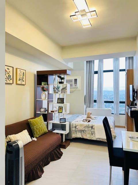 Bed, Living room, Seating area, Bedroom