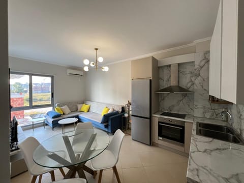 Kitchen or kitchenette, Living room, Seating area, Dining area, stove